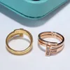 Neuer Luxusliebes-Ring-Diamant-Draht-Ring-Designer-Schmuck 18k Goldband-Versprechungsringe für Frauenmänner Schlumbergers-Valentinstaggeschenk-Randüberbrückungsring Ursprünglicher blauer Kasten