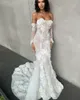 花嫁のための長袖マーメイドドレス3Dフローラルアップリケレースウェディングドレスボタンバックブライダルガウン