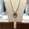 チェーンは天然9〜10 mmの白い淡水真珠のネックレス長いマイクロインレイジルコンクラスプセーターチェーンタッセルファッションジュエリーを販売しています