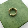 2023 nowy designerski pierścionek złoty wzór kwiatowy miłość luksusowe pierścionki niebieski diament moda damska biżuteria mężczyźni Shining Ggity list z pudełkiem