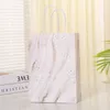 Brocada de presente 5pcs Design de mármore Kraft Paper Gift Bag com Handle Birthday Party Packaging Greis de casamento para convidados Eid Ramadan Supplies 2303331