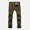 Pantaloni da uomo Pantaloni invernali impermeabili da uomo Pantaloni casual spessi caldi in pile di pelle di squalo Giacca a vento maschile Pantaloni sportivi elastici Pantaloni tattici da uomo W0325