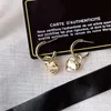 18k Gold Stamp örhängen Stud Luxury örhängen Fashion Women Heart Earring Designer smycken utsökta höga förnuft Tillbehör Giftälskare med Box Populärt varumärke