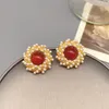 Boucles d'oreilles à tige européenne et américaine rétro baroque perle incrustée d'agate rouge pour les femmes bijoux de mode exquis en gros