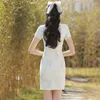 Etnische kleding cheongsam jonge stijl mode high -end comfortabele verbetering lang eenvoudig elegant meisje witte kant 2023 lente zomer