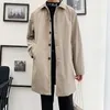 Trench da uomo M5XL Cappotto taglie forti Vestibilità ampia Risvolto lungo Giacca a vento monopetto Bottone Soprabito Abbigliamento uomo XXXXXL 230331