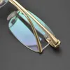 En lüks tasarımcı güneş gözlükleri% 20 indirimli leopar kafa moda iş yüksek uç çerçevesiz miyopi gözlükleri çerçeve saf titanyum basit