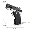 Party Favor 1pc Mini Toy Metal Gun With Rubber Band Fun Folding Pistol Key Charm Pendant Kids Födelsedagspresenter Toys Boy Girl Game Party Favors 230331