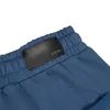 Designer pour hommes moussais décalage à imprimé fleur décontracté shorts en vrac de dessin corde en métal bouton sport cinquième pantalon 11