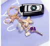 Creative cristal strass trèfle porte-clés voiture porte-clés femme mignon fleur porte-clés femmes sac Auto pendentif cadeau
