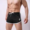 Shorts masculinos largam os shorts shorts shorts flecunts masculinos shorts esportivos ginásios de boxers soltos respiráveis ​​calças casuais curtas verão w0327