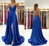 Seksowne królewskie błękitne rozdzielone bal maturalne paski spaghetti bez pleców długie ukończenie imprezowych sukienki wieczorne sukienki BC9431