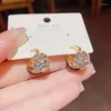 2024 Boucles d'oreilles Stud Cube Zircon Pendant Boucle d'oreille Boule de boucles à deux côtés Boucle d'oreilles bijoux de mariage pour femmes pour femmes Rubik's Cube