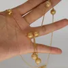 Collana Orecchini Set Manna Charm Ball Set Colore oro Piccoli grumi Dubai Colla per donne / ragazze Gioielli africani etiopi presenti