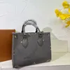 Tasarımcı Çanta Tote Çanta Deri Lüks Çantalar Çantalar Crossbody Çantalarda Alışveriş Torbası Omuz Kemer Çantası Debriyaj Kabartmalı Çanta Çanta Çanta Klasik Tates Çanta