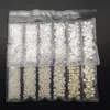 Décorations d'art d'ongle Super Glitter 1440pcs / pack Couleurs blanches Perles d'imitation Artisanat Demi-rond Flatback Perles Décoration de vêtement pour la couture