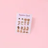 Stud -oorbellen 12 pair/set gouden kleur roestvrij staal voor vrouwen minimalistische ster hart vlinder bloemvorm kleine studs sieraden