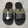 Lyxdesigner mode män sandaler tofflor flip flops casual strandskor läder material hög kvalitetssäkring med låda