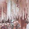 装飾的な花1/2pcs 110cm人工シルクフラワーブドウのラタンハンギングガーランドウェディングホームガーデンウォールデコレーション偽の弦の花輪