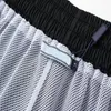 pantaloncini da uomo di lusso pantalone designer uomo estate lettera stampata tasca coulisse pantaloncini casual uomo sport fitness all'aperto corsa pantaloni da spiaggia versatili larghi