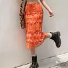 Jupes été femmes mode Boho plage jupe florale femme Style décontracté Orange fête de vacances Streetwear taille haute Midi