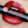 Brilliance autorstwa Reina Rebelde Lip Gloss w Malinche Red Shimmer