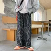 Jeans masculinos Spring Men calça jeans impressa Casual Fashion Streetwear Japão Estilo Retro Drawtring Mapping Troushers