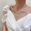 Catene Elegante collana di perle d'imitazione per le donne Catena a maglie grosse in oro Asimmetria Chiusura a levetta Girocolli a cerchio 2023 TrendChains