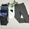 Pantalones activos estampados Yoga gimnasio leopardo mallas para mujer mallas deportivas con bolsillos dobles nailon correr Fitness entrenamiento mallas femeninas