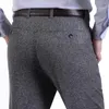 Pantalon masculin 2023 Brand pantalon masculin pour hommes d'âge moyen décontracté mince pour le pantalon de tailleur haut de taille high mâle régulier régulier