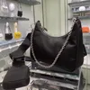 Re-Edition luxurys designer Borse a tracolla borse a tracolla borsa di design borsa di alta qualità 10A Re-Nylon tracolla regolabile Portamonete con scatola