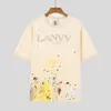 Lanvis Men's SS 24 Designer T -skjorta Shorts Fashion and Women's Beige Speckle Alphabet Print Trendy Lanvis Curb Casual Loose Half Sleeve White Lanvis Shirt 9847