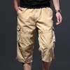 Heren shorts Men bijgesneden broek vaste kleur dun los type middenkalf lengte rekbare taille mannen vrachtbroek losse herenkleding streetwear 230503
