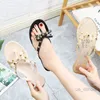 Chaussures habillées 2022 offre spéciale mode femmes tongs chaussures d'été Cool plage grand arc sandales plates chaussures de gelée sandales filles taille 36-42