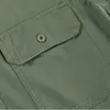 Chemises décontractées pour hommes Tactique pour hommes Uniforme militaire Chemise cargo à manches longues Conception de veste Asymétrique Poche Coton Lavé Style Safari