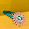 Pinzas para el cabello de diseñador de lujo Horquillas de nuevo estilo para mujer Pasadores retro Señoras Carta de personalidad simple Pinza para el cabello de girasol europeo y americano