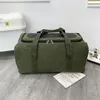 Duffel Bags Men's Travel Bag stor kapacitet Kort avstånd bagage damer fitness canvas bärbara handväskor kvinnor