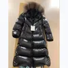 Coats women's winter jacket long down jacket Filled with white goose down oversized fox fur Belt included solid color overcoat