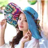 Chapeaux à large bord femmes disquette fleur imprimé réversible arc chapeau de soleil avec grande plage d'été deux côtés peuvent porter une casquette Protection UV