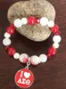 Strand Hand Made Elastic Greek Sorority Red White Pearl Aeo Charm Pendant Armband smycken Tillbehör