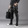 Pants Mode homme noir Joggers serré jeunesse sarouel hommes mince coréen moto cuir pantalon Pu automne hiver Rivets pantalon