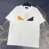 Kvinnors T-shirtdesigner 2023 Spring/Summer New Product Pares Little Monster Eye Print Round Neck Kort ärm T-shirt Män och topp Elan