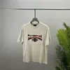 2023 Summer Mens Designer T Shirt Casual Man Damskie TESE Z literami Drukuj krótkie rękawy