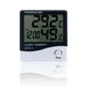 Digital LCD-temperatur Hygrometer Instrument Klockfuktighet Mätertermometer med klockkalenderalarm HTC-1