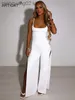 Jumpsuits voor dames rompers articat sexy backless high spleit dames jumpsuits witte spaghetti riem elegante jumpsuit vrouwelijke zomer slanke feestclubkleding t230504