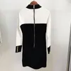 Robes décontractées noir blanc femmes 2023 Lion bouton fermeture éclair élastique maigre tricot élégant Vestidos vêtements femme robe crayon