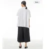 日本の不規則なスプレッチ半袖シャツ2023夏の新しい大きな女性用ルーズプリントシャツ
