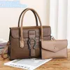 Whole ladies leathers shoulder bags small fresh color matching leather handbag large embossed retro pillow bag this year'231K