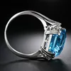 Fedi nuziali di alta qualità fascino femminile rettangolo pietra grande blu per le donne argento colore intarsio cristallo bianco anello zircone quadrato all'ingrosso