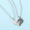 En gros 12pcs / douzaine couple d'amoureux Une paire de collier de diamants en forme de coeur Couple Amitié Puzzle CZ Amour Correspondant Je t'aime Coeur Pendentifs Ensemble